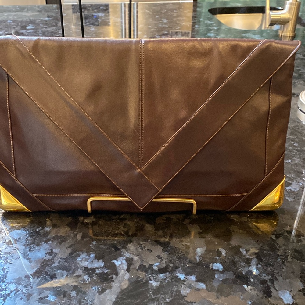 Large  brown envelope leather clutch attached wallet attached mirror